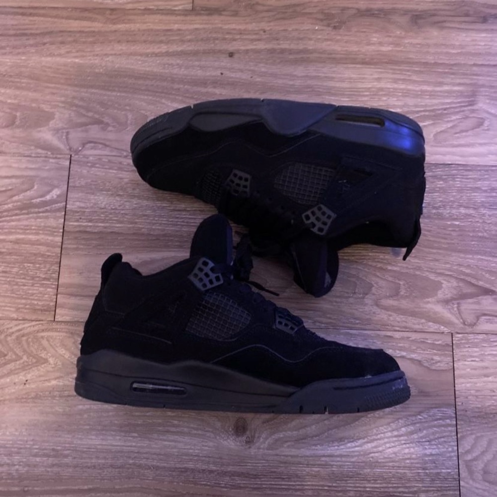 black cat jordan 4s